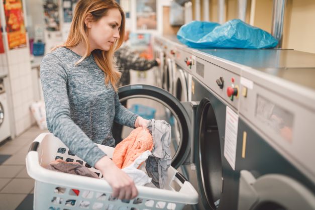 Woman in laundromat